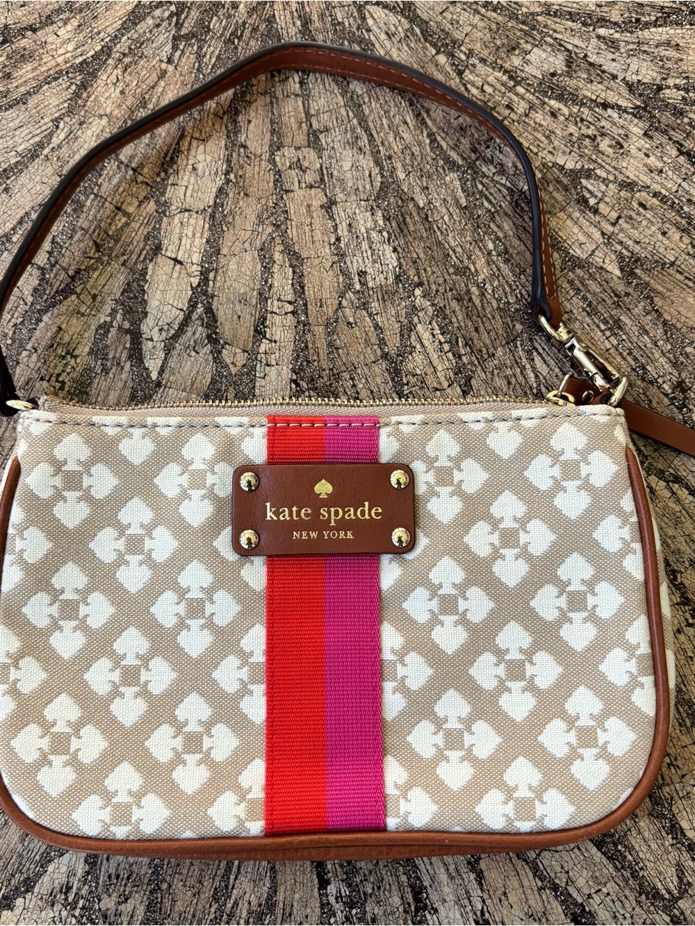 kate spade Beige Patterned Wristlet with Red and Pink Stripe